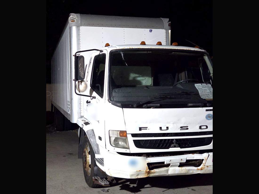 Heavy Hitter Transport's actual 22-foot Fuso box truck cargo box, side view